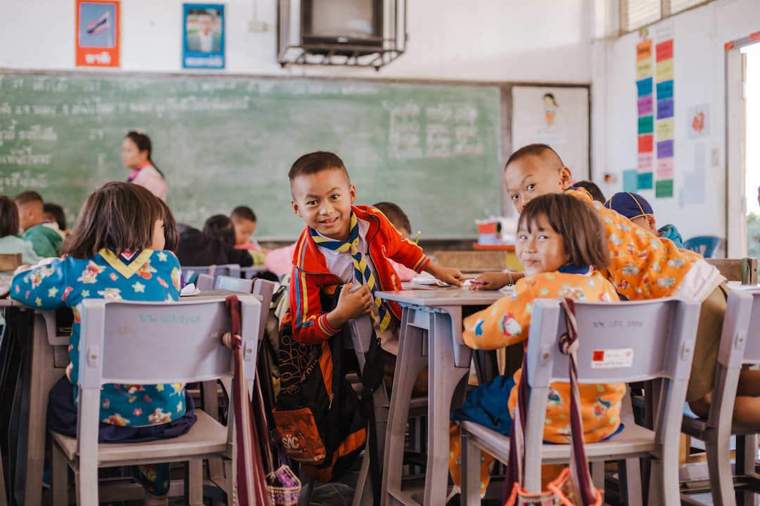 elementary school students happily learning Spanish in a classroom setting